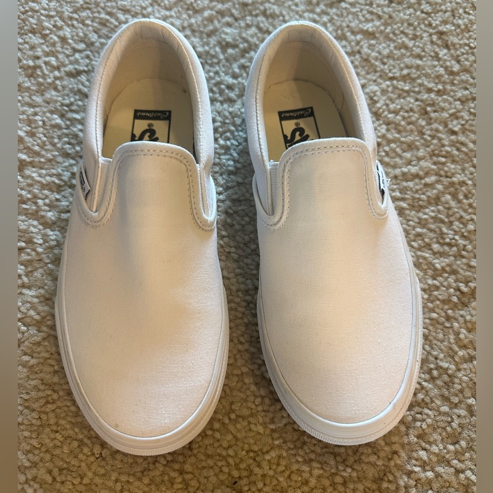 Vans White Canvas Slip-On Sneakers